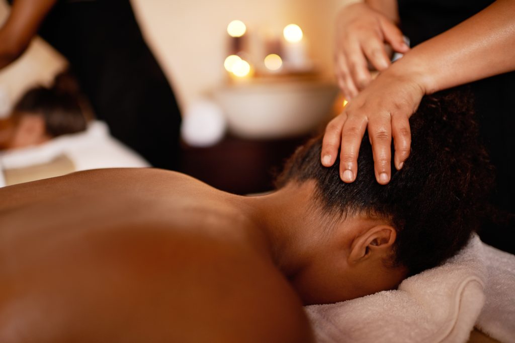 a person getting a massage at a spa